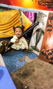 child at market siem reap